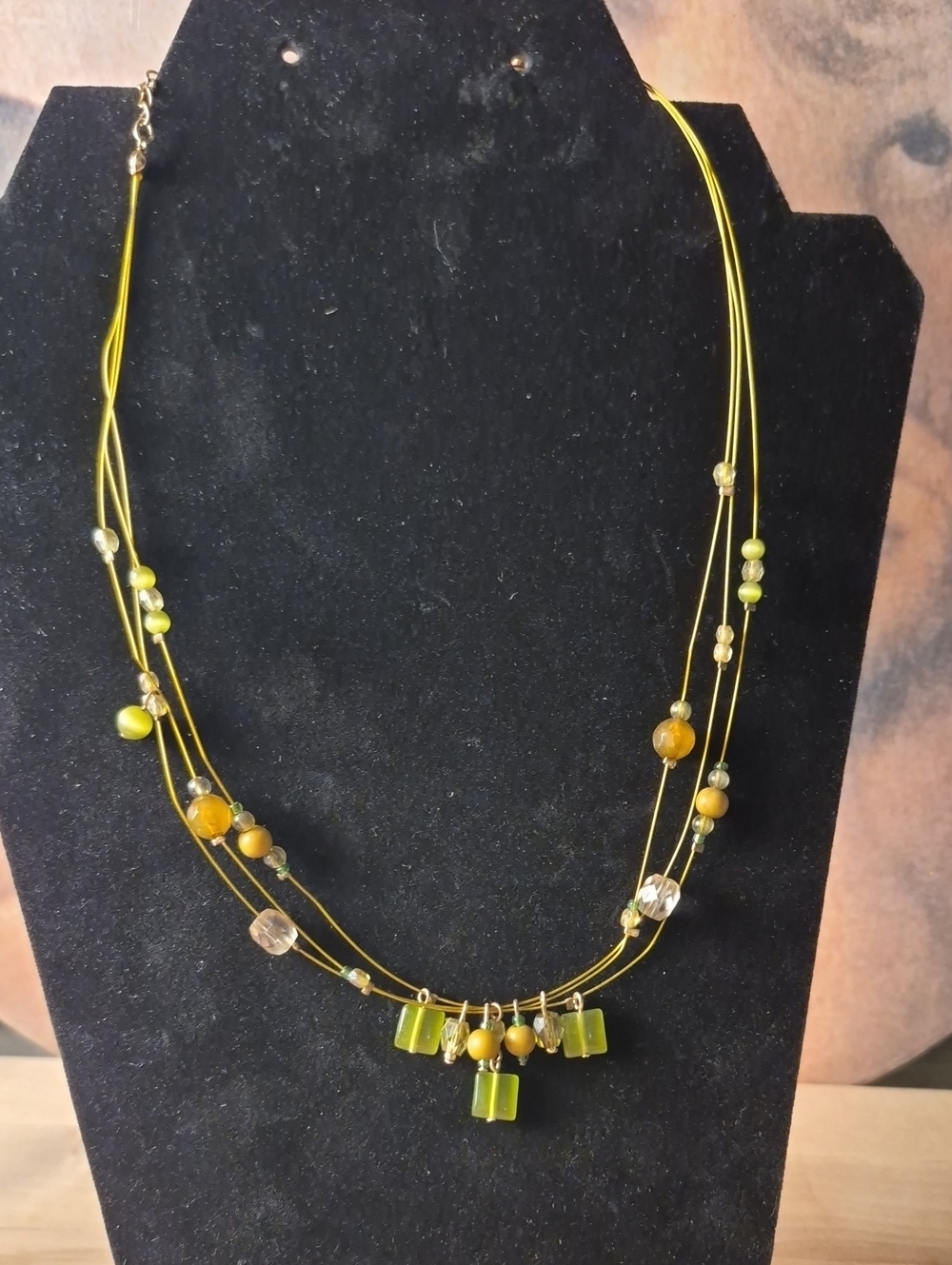 Delicate Green Multi-Strand Beaded Necklace with Gold Accents